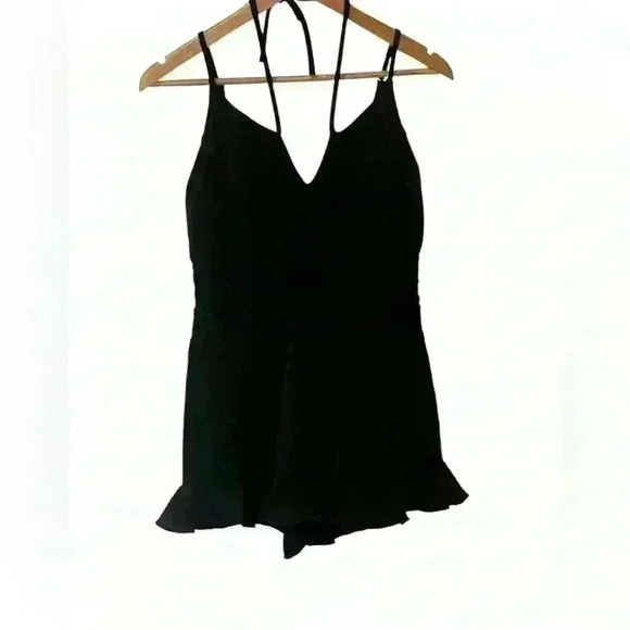 Black Romper Embroidered floral design , ruffle hem, zip up adjustable straps - Picture 2 of 13